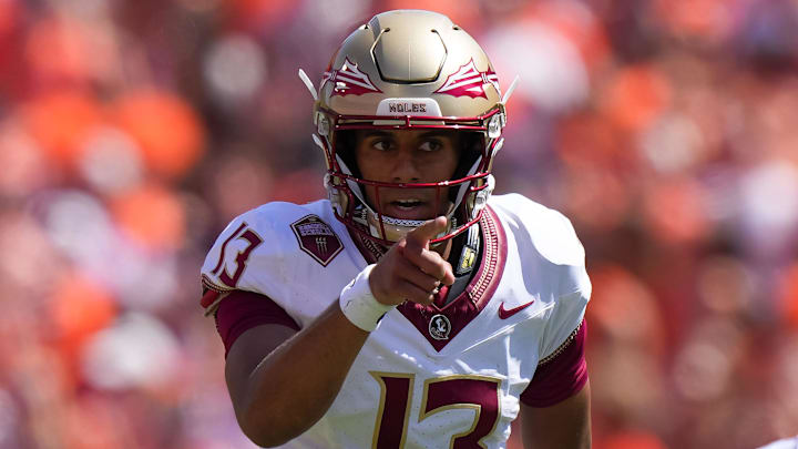Sep 23, 2023; Clemson, South Carolina, USA; Florida State Seminoles quarterback Jordan Travis (13) in the first half against the Clemson Tigers at Memorial Stadium. Mandatory Credit: David Yeazell-Imagn Images Sep 23, 2023; Clemson, South Carolina, USA; Florida State Seminoles quarterback Jordan Travis (13) in the first half against the Clemson Tigers at Memorial Stadium. Mandatory Credit: David Yeazell-Imagn Images