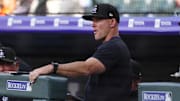 May 21, 2025; Denver, Colorado, USA; Colorado Rockies interim manager Warren Schaeffer (34) in the dugout in the first inning against the Philadelphia Phillies at Coors Field.