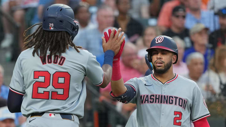 Aug 13, 2024; Baltimore, Maryland, USA; Washington Nationals outfielder James Wood (29) greeted by second baseman Luis Garcia Jr. (2) after scoring in the fourth inning against the Baltimore Orioles at Oriole Park at Camden Yards.