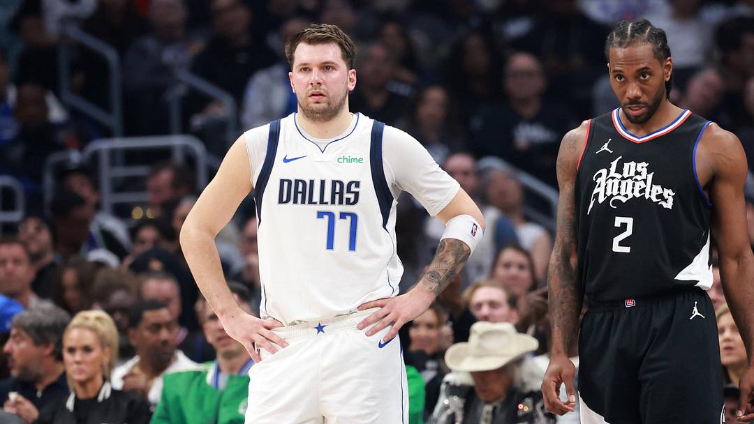 Apr 23, 2024; Los Angeles, California, USA; Dallas Mavericks guard Luka Doncic (77) and Los Angeles Clippers forward Kawhi Leonard (2) stand on the floor during the first quarter of game two of the first round for the 2024 NBA playoffs at Crypto.com Arena. Mandatory Credit: Kiyoshi Mio-Imagn Images Apr 23, 2024; Los Angeles, California, USA; Dallas Mavericks guard Luka Doncic (77) and Los Angeles Clippers forward Kawhi Leonard (2) stand on the floor during the first quarter of game two of the first round for the 2024 NBA playoffs at Crypto.com Arena. Mandatory Credit: Kiyoshi Mio-Imagn Images