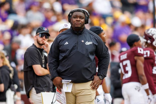 Texas A&M Aggies interim head coach Elijah Robinson looks on against the LSU Tigers during the second half at Tiger Stadium.