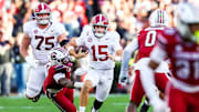 Oct 25, 2025; Columbia, South Carolina, USA; Alabama Crimson Tide quarterback Ty Simpson (15) scrambles for a first down on fourth down against the South Carolina Gamecocks in the second quarter at Williams-Brice Stadium. Mandatory Credit: Jeff Blake-Imagn Images