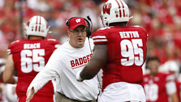 Sep 17, 2022; Madison, Wisconsin, USA;  Wisconsin Badgers head coach Paul Chryst celebrates following a touchdown during the first quarter against the New Mexico State Aggies at Camp Randall Stadium. Mandatory Credit: Jeff Hanisch-Imagn Images