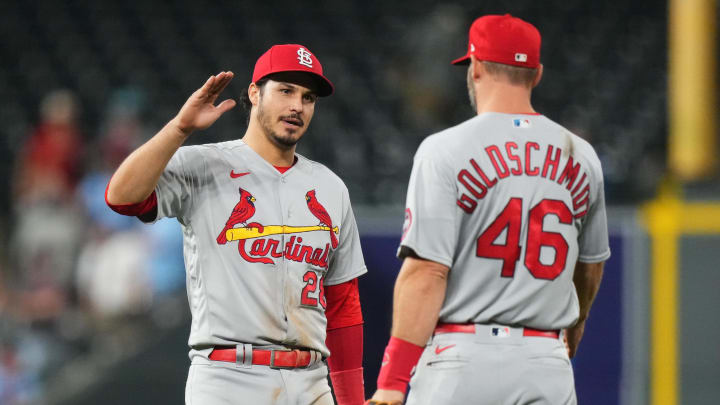 Apr 11, 2023; Denver, Colorado, USA; St. Louis Cardinals third baseman Nolan Arenado (28) and first baseman Paul Goldschmidt (46) celebrate defeating the Colorado Rockies at Coors Field. Mandatory Credit: Ron Chenoy-USA TODAY Sports