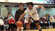Stepinac's Jasiah Jervis (25) and Iona's Joe Wolf (11) battle for a loose ball during the Crusader Classic at the Westchester County Center in White Plains Jan. 4, 2025.