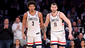 Mar 13, 2025; New York, NY, USA; Connecticut Huskies forward Jaylin Stewart (3) and forward Alex Karaban (11) during the second half against the Villanova Wildcats at Madison Square Garden. Mandatory Credit: Brad Penner-Imagn Images