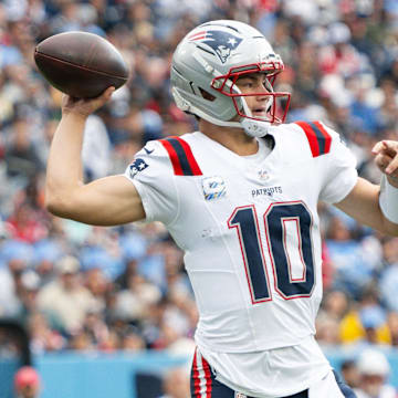 Oct 19, 2025; Nashville, Tennessee, USA;  New England Patriots quarterback Drake Maye (10) throws a pass against the Tennessee Titans during the first half at Nissan Stadium. Mandatory Credit: Steve Roberts-Imagn Images