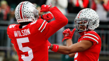 Sat., Nov. 20, 2021; Columbus, Ohio, USA; Ohio State Buckeyes wide receiver Garrett Wilson (5) celebrates after a touchdown with teammate Ohio State Buckeyes wide receiver Chris Olave (2) during the first quarter of a NCAA Division I football game between the Ohio State Buckeyes and the Michigan State Spartans at Ohio Stadium. Mandatory Credit: Joshua A. Bickel/Columbus Dispatch via USA TODAY Network.

Cfb Michigan State Spartans At Ohio State Buckeyes