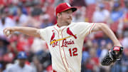St. Louis Cardinals starting pitcher Erick Fedde (12) throws against the Los Angeles Dodgers at Busch Stadium. 