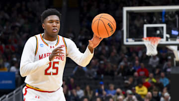 Mar 23, 2025; Seattle, WA, USA; Maryland Terrapins center Derik Queen (25) passes the ball against the Colorado State Rams in the first half at Climate Pledge Arena. Mandatory Credit: Steven Bisig-Imagn Images