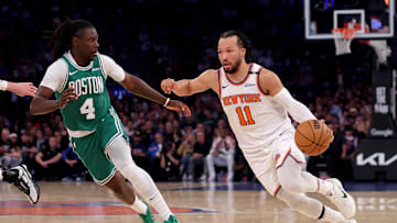May 16, 2025; New York, New York, USA; New York Knicks guard Jalen Brunson (11) drives to the basket against Boston Celtics guard Jrue Holiday (4) during the second quarter of game six in the second round of the 2025 NBA Playoffs at Madison Square Garden. Mandatory Credit: Brad Penner-Imagn Images