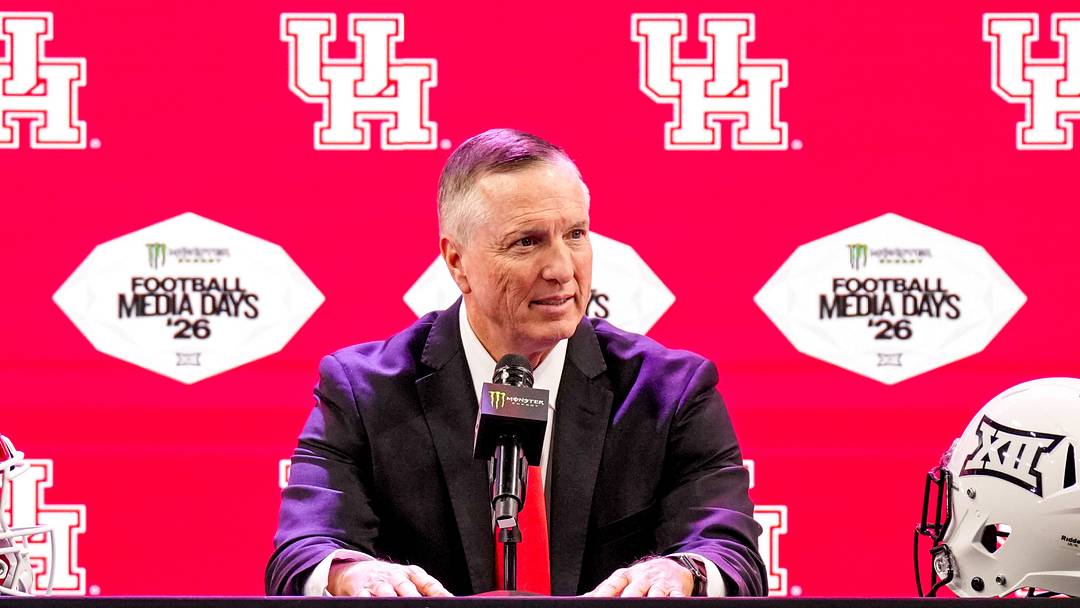 Jul 7, 2026; Frisco, TX, USA; Houston head coach Willie Fritz speaks to reporters during Big 12 Conference Football Media Days at The Star. Mandatory Credit: Raymond Carlin III-Imagn Images Jul 7, 2026; Frisco, TX, USA; Houston head coach Willie Fritz speaks to reporters during Big 12 Conference Football Media Days at The Star. Mandatory Credit: Raymond Carlin III-Imagn Images