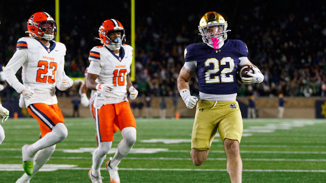 Notre Dame running back Aneyas Williams (22) runs the ball into the end zone for a touchdown in the second half of a NCAA football game against Syracuse at Notre Dame Stadium on Saturday, Nov. 22, 2025, in South Bend.