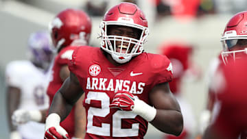 Sep 2, 2023; Little Rock, Arkansas, USA; Arkansas Razorbacks linebacker Brad Spence (22) celebrates after returning an interception for a touchdown in the fourth quarter against the Western Carolina Catamounts at War Memorial Stadium. Arkansas won 56-13. Mandatory Credit: Nelson Chenault-Imagn Images
