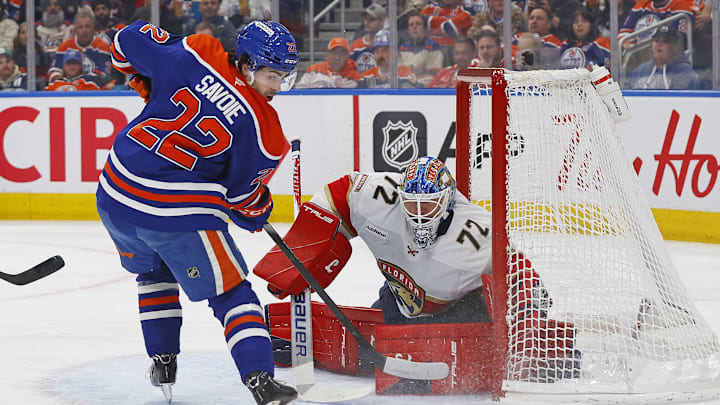 Mar 19, 2026; Edmonton, Alberta, CAN; Edmonton Oilers forward Matt Savoie (22) looks for a loose puck in front of Florida Panthers goaltender Sergei Bobrovsky (72) during the first period at Rogers Place. Mandatory Credit: Perry Nelson-Imagn Images