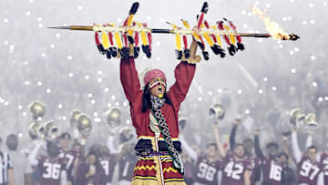 Nov 25, 2022; Tallahassee, Florida, USA; Florida State Seminoles symbol Chief Osceola plants the spear at midfield before the game against the Florida Gators at Doak S. Campbell Stadium. Mandatory Credit: Melina Myers-Imagn Images