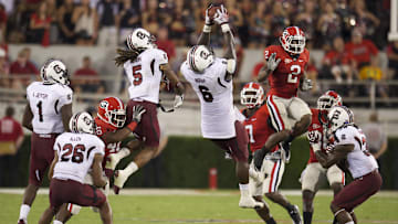 South Carolina football defensive lineman Melvin Ingram fielding an onside kick to secure a win over the rival Georgia Bulldogs in 2011