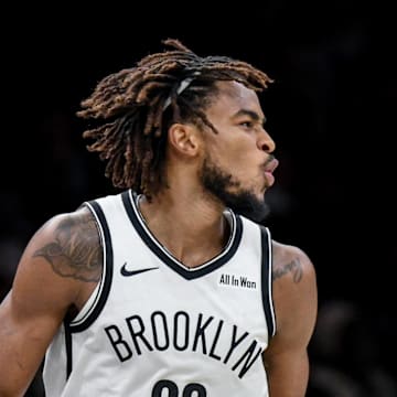 Nov 3, 2025; Brooklyn, New York, USA; Brooklyn Nets center Nic Claxton (33) reacts after scoring a basket against the Minnesota Timberwolves during the first half at Barclays Center. Mandatory Credit: John Jones-Imagn Images