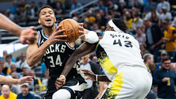 Apr 22, 2025; Indianapolis, Indiana, USA; Milwaukee Bucks forward Giannis Antetokounmpo (34) shoots the ball while Indiana Pacers forward Pascal Siakam (43) defends during game two of first round for the 2024 NBA Playoffs at Gainbridge Fieldhouse. Mandatory Credit: Trevor Ruszkowski-Imagn Images