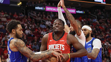 Rockets center Clint Capela fights for a rebound during game against the Dallas Mavericks. 