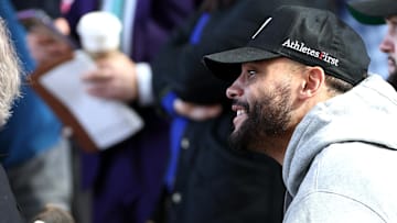 Dallas Cowboys quarterback Dak Prescott listens to head coach Brian Schottenheimer (not pictured)  at a press conference at the Star. 