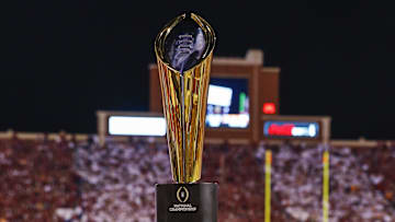 Sep 13, 2014; Norman, OK, USA; College Football playoff championship trophy on the field during the game between the Oklahoma Sooners and Tennessee Volunteers at Gaylord Family - Oklahoma Memorial Stadium. Mandatory Credit: Kevin Jairaj-Imagn Images