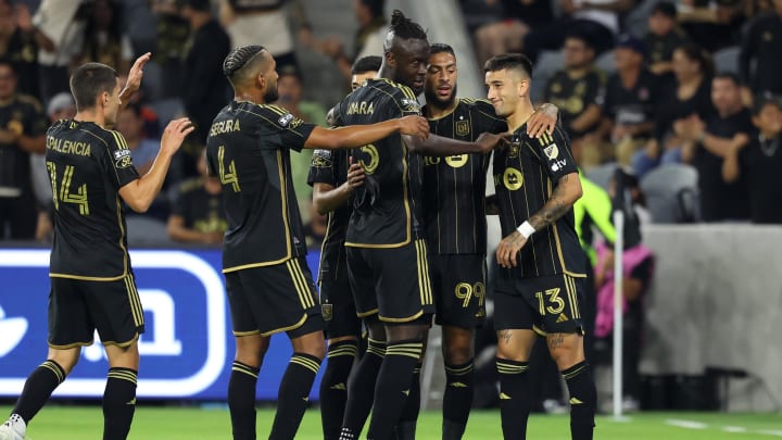 Jul 26, 2024; Los Angeles, California, USA;  LAFC Cristian Olivera (13) celebrates with teammates after scoring a goal during the first half against the Club Tijuana at BMO Stadium. Mandatory Credit: Kiyoshi Mio-USA TODAY Sports