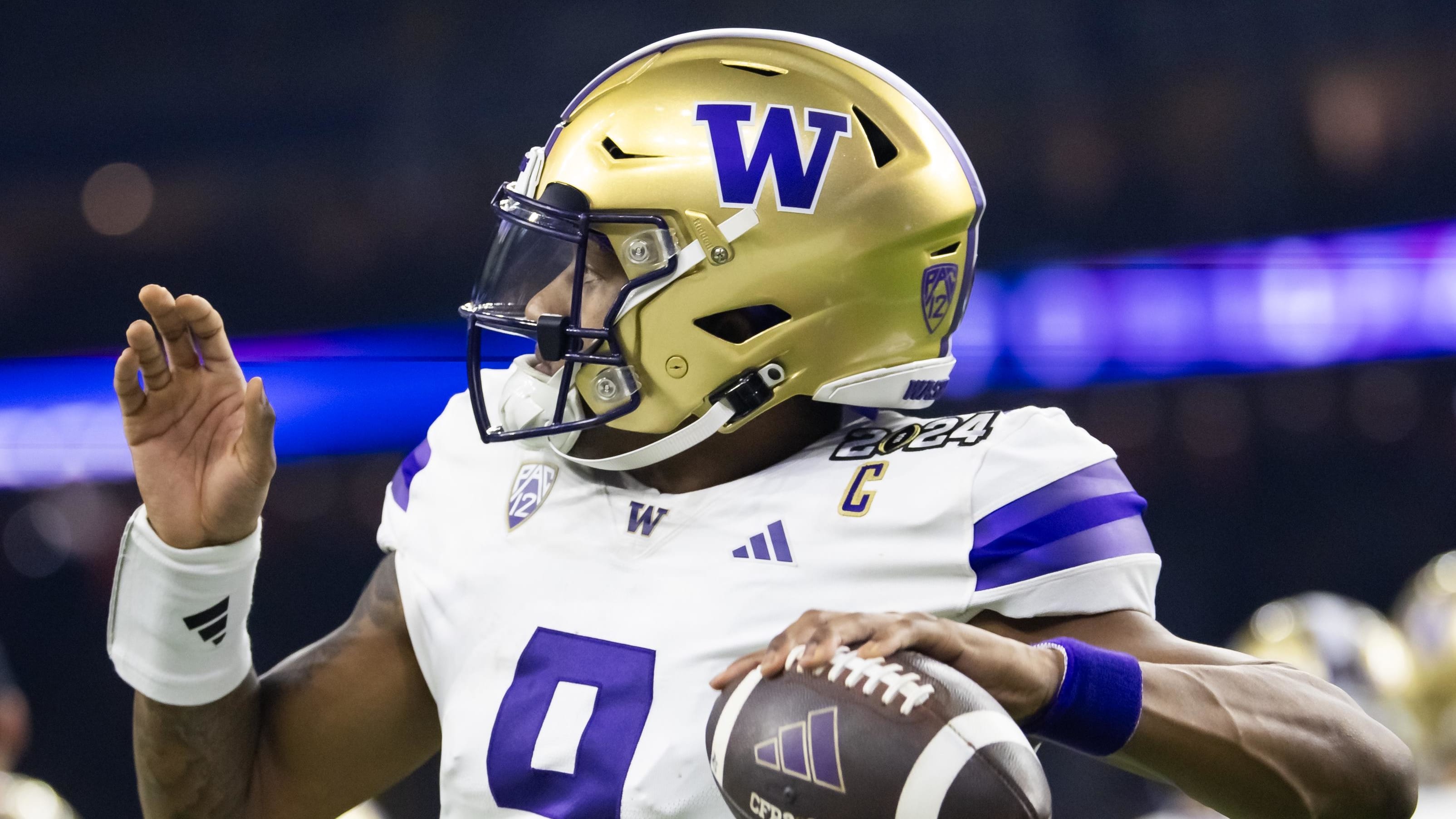 Washington Huskies quarterback Michael Penix Jr. throws the ball.