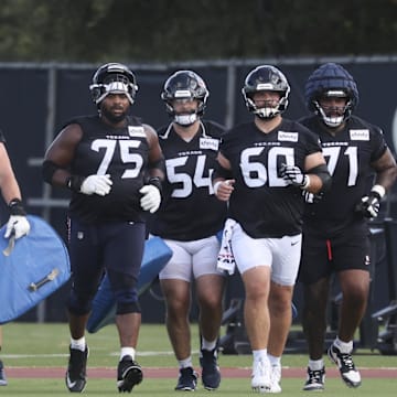 Jul 24, 2025; Houston, TX, USA; Houston Texans offensive linemen during training camp at Houston Methodist Training Center. Mandatory Credit: Troy Taormina-Imagn Images