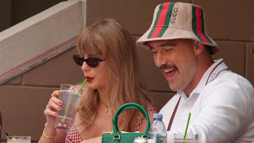 Taylor Swift and Travis Kelce enjoying tennis
