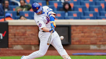 Apr 4, 2024; New York City, New York, USA; New York Mets first baseman Pete Alonso (20) hits a single against the Detroit Tigers during the fifth inning at Citi Field.