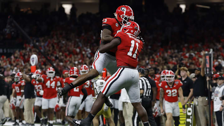 Jan 2, 2025; New Orleans, LA, USA; Georgia Bulldogs linebacker Jalon Walker (11) celebrates with Bulldogs defensive lineman Mykel Williams (13) after making a defensive stop against the Notre Dame Fighting Irish during the first quarter at Caesars Superdome. Mandatory Credit: Geoff Burke-Imagn Images Jan 2, 2025; New Orleans, LA, USA; Georgia Bulldogs linebacker Jalon Walker (11) celebrates with Bulldogs defensive lineman Mykel Williams (13) after making a defensive stop against the Notre Dame Fighting Irish during the first quarter at Caesars Superdome. Mandatory Credit: Geoff Burke-Imagn Images