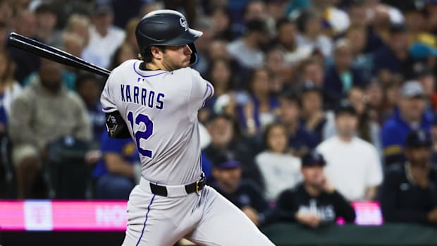 Sep 23, 2025; Seattle, Washington, USA; Colorado Rockies third baseman Kyle Karros (12) hits an RBI-infield single.