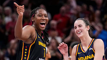 Indiana Fever forward Aliyah Boston (7) celebrates with Indiana Fever guard Caitlin Clark (22) altering recording a triple-double Wednesday, Sept. 4, 2024, during the game at Gainbridge Fieldhouse in Indianapolis. The Indiana Fever defeated the Los Angeles Sparks, 93-86.