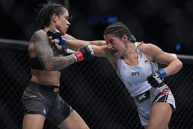 Julianna Pena upset Amanda Nunes during UFC 269 at T-Mobile Arena. 
