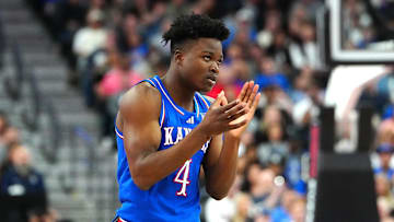 Nov 26, 2024; Las Vegas, Nevada, USA; Kansas Jayhawks guard Rakease Passmore (4) applauds after a play against the Duke Blue Devils during the first half at T-Mobile Arena. Mandatory Credit: Stephen R. Sylvanie-Imagn Images