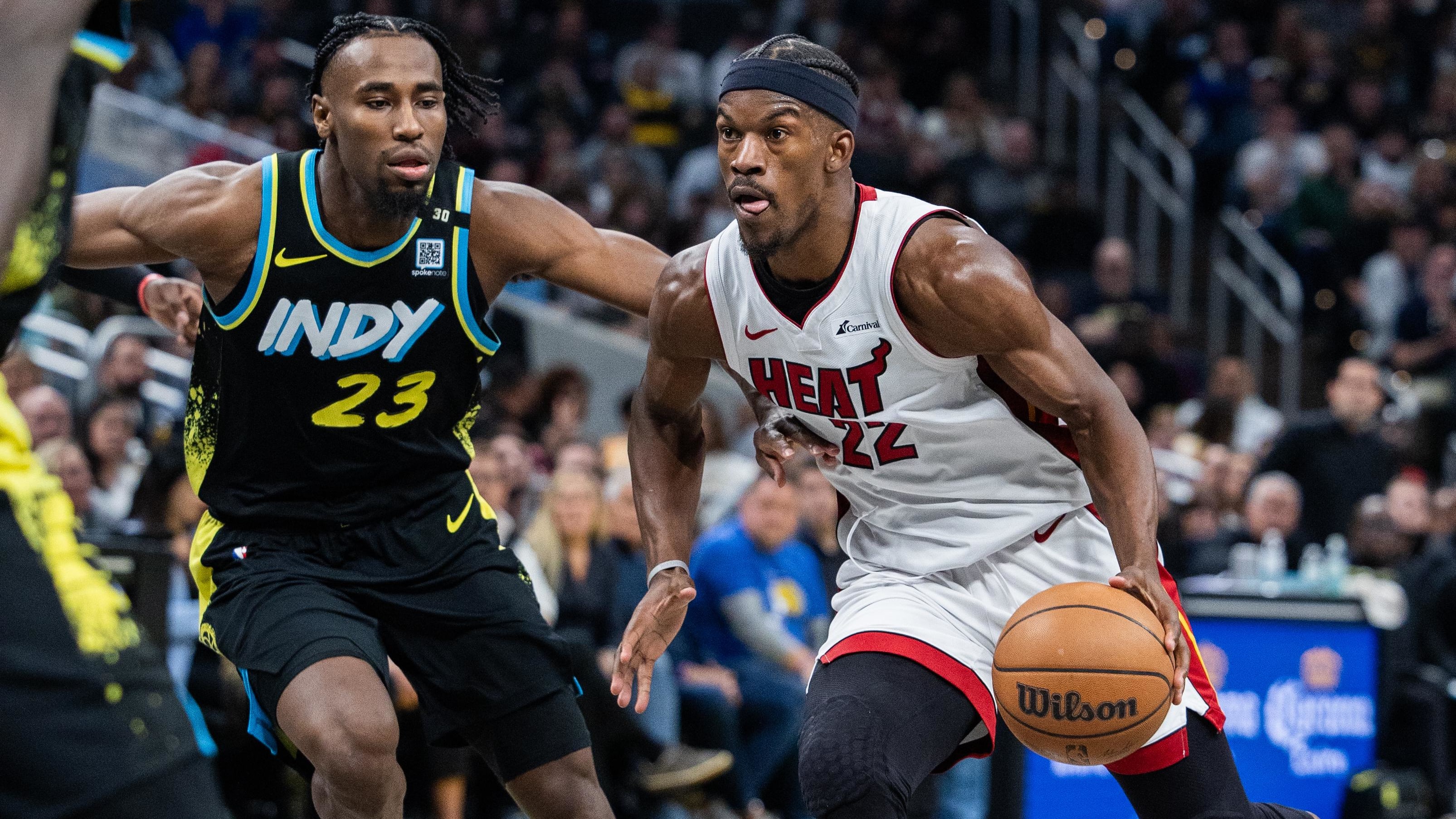 Apr 7, 2024; Indianapolis, Indiana, USA; Miami Heat forward Jimmy Butler (22) dribbles the ball