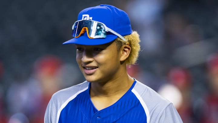 Aug 28, 2022; Phoenix, Arizona, US; East infielder Tai Peete (7) during the Perfect Game All-American Classic high school baseball game at Chase Field. Mandatory Credit: Mark J. Rebilas-Imagn Images
