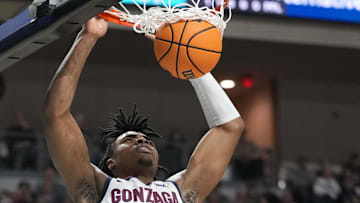 Gonzaga Bulldogs guard Michael Ajayi (1) dunks the basketball against San Francisco Dons center Saba Gigiberia