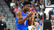 Nov 26, 2024; Las Vegas, Nevada, USA; Kansas Jayhawks guard Rakease Passmore (4) applauds after a play against the Duke Blue Devils during the first half at T-Mobile Arena. Mandatory Credit: Stephen R. Sylvanie-Imagn Images