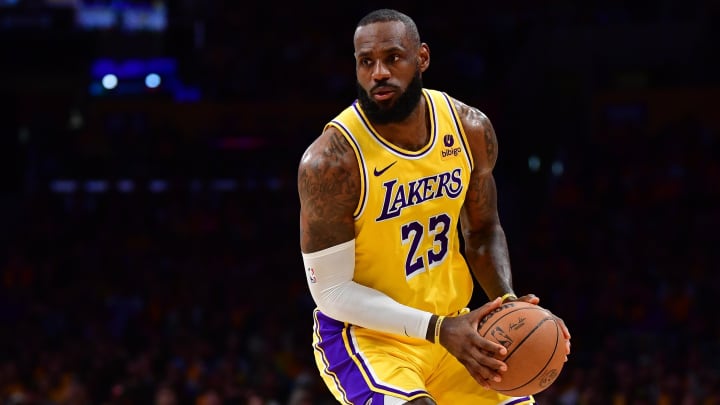 Apr 25, 2024; Los Angeles, California, USA; Los Angeles Lakers forward LeBron James (23) controls the ball against the Denver Nuggets during the second half in game three of the first round for the 2024 NBA playoffs at Crypto.com Arena. Mandatory Credit: Gary A. Vasquez-USA TODAY Sports