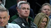 Dec 2, 2025; East Lansing, Michigan, USA;  Michigan State head football coach Pat Fitzgerald watches the Spartans defeat the Iowa Hawkeyes at Jack Breslin Student Events Center.