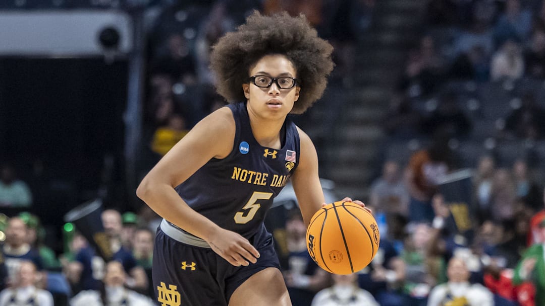 Mar 29, 2025; Birmingham, AL, USA; Notre Dame Fighting Irish guard Olivia Miles (5) works the ball down the court against the TCU Horned Frogs during the first half of a Sweet 16 NCAA Tournament basketball game at Legacy Arena. Mandatory Credit: Vasha Hunt-Imagn Images