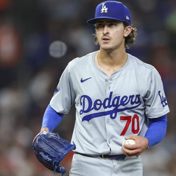 Jul 27, 2024; Houston, Texas, USA; Los Angeles Dodgers starting pitcher Justin Wrobleski (70) reacts after a pitch during the sixth inning against the Houston Astros at Minute Maid Park. Mandatory Credit: Troy Taormina-USA TODAY Sports