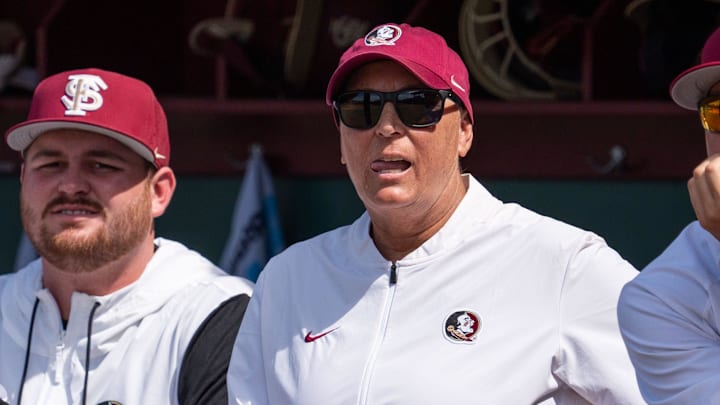 Florida State Seminoles head coach Lonni Alameda watches from the dugout. The Texas Tech Red Raiders defeated the Florida State Seminoles 2-1 in the NCAA WCWS Super Regionals on Friday, May 23, 2025.