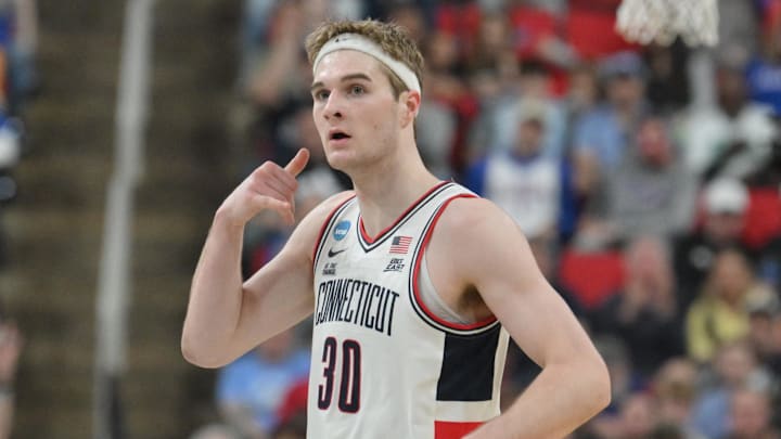 Mar 21, 2025; Raleigh, NC, USA; Connecticut Huskies forward Liam McNeeley (30) reacts during the first half against the Oklahoma Sooners at Lenovo Center. Mandatory Credit: Zachary Taft-Imagn Images Mar 21, 2025; Raleigh, NC, USA; Connecticut Huskies forward Liam McNeeley (30) reacts during the first half against the Oklahoma Sooners at Lenovo Center. Mandatory Credit: Zachary Taft-Imagn Images