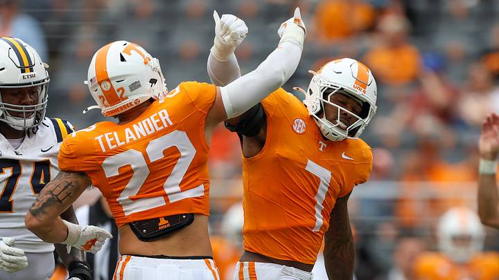 Sep 6, 2025; Knoxville, Tennessee, USA; Tennessee Volunteers linebacker Jeremiah Telander (22) and  linebacker Arion Carter (7) react to a play against the East Tennessee State Buccaneers during the second half at Neyland Stadium. Mandatory Credit: Randy Sartin-Imagn Images