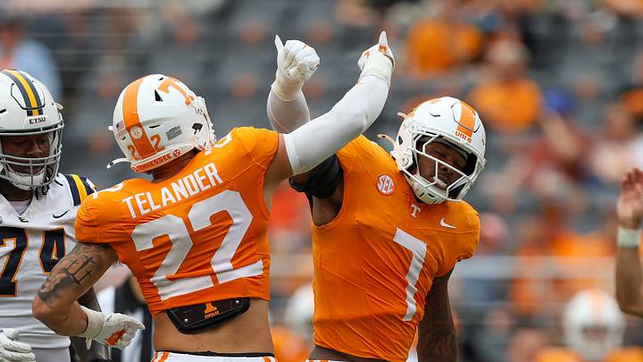 Sep 6, 2025; Knoxville, Tennessee, USA; Tennessee Volunteers linebacker Jeremiah Telander (22) and  linebacker Arion Carter (7) react to a play against the East Tennessee State Buccaneers during the second half at Neyland Stadium. Mandatory Credit: Randy Sartin-Imagn Images