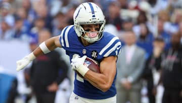 Oct 12, 2025; Indianapolis, Indiana, USA; Indianapolis Colts wide receiver Alec Pierce (14) carries the ball against the Arizona Cardinals 