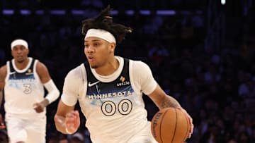 Feb 27, 2025; Los Angeles, California, USA; Minnesota Timberwolves guard Terrence Shannon Jr. (00) dribbles during the fourth quarter against the Los Angeles Lakers at Crypto.com Arena. Mandatory Credit: Jason Parkhurst-Imagn Images